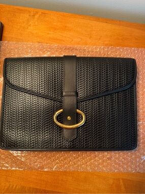 Black vintage Christian Dior Textured Leather Clutch with gold hardware.